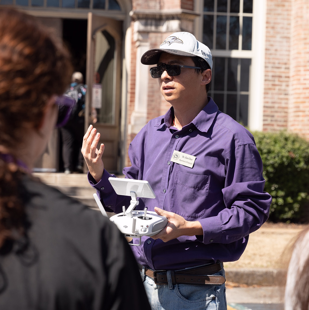 Dr. Chen at research location